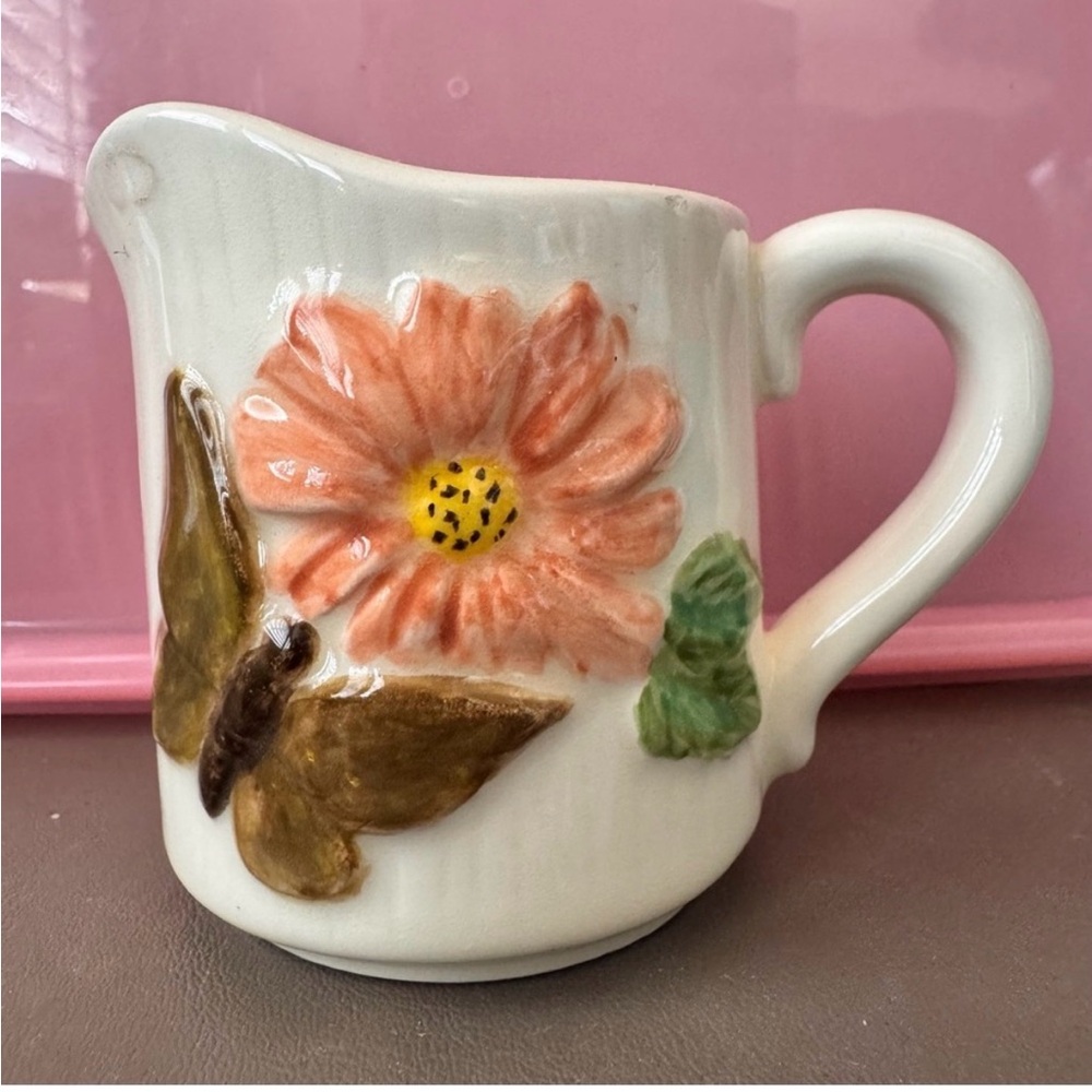 Floral Ceramic Pitcher with Butterfly Design